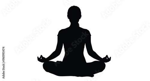 Woman meditating in lotus position a striking black silhouette