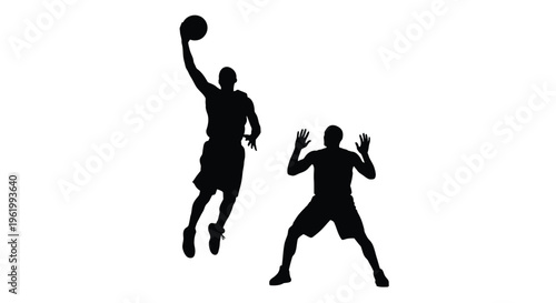 Basketball players in action one shooting and one defending silhouette