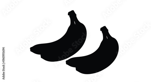 Two ripe bananas are depicted in striking black silhouette