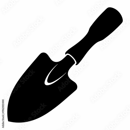 Black silhouette of a hand trowel used for gardening and transplanting