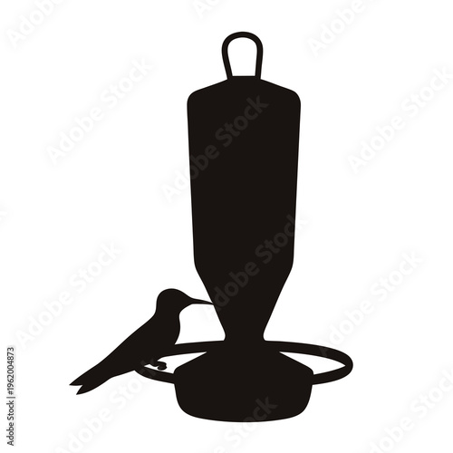 Silhouette of Hummingbird Feeding from a Bird Feeder, isolated on white