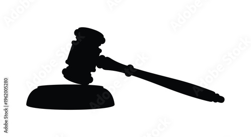A black silhouette of a gavel resting on a sounding block silhouette