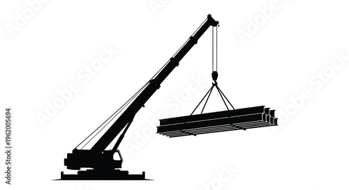Construction crane lifting steel beams a dramatic black silhouette