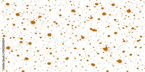 Abstract a close-up image showcases a textured surface adorned with splatters of earthy tones, offering a visually engaging pattern.