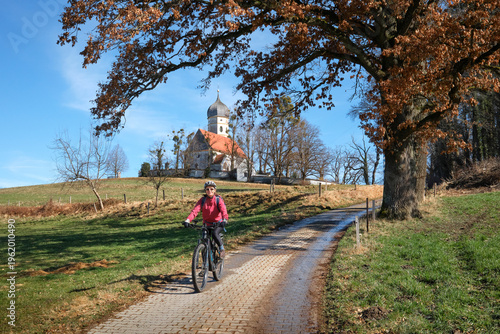 Active senior woman riding ...