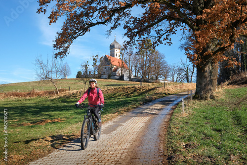 Active senior woman riding ...