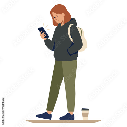 A woman walks while looking at her phone with a backpack on and coffee cup beside her.