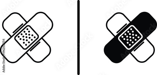 A simple illustration of two bandages in black and white