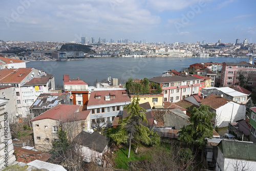Sunny urban landscape overlooking Istanbul separated by Golden Horn Bay