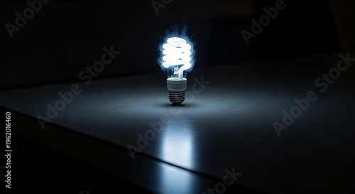 Light Bulb Glowing in Dark Space.