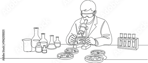 Scientist working in laboratory with various equipment