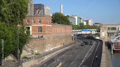High angle street traffic in 12th arrondissement Paris, France. Blue sky, sunny summer day.