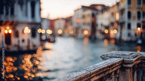 Historic venetian canal with gondolas and traditional buildings creating soft focus bokeh atmosphere