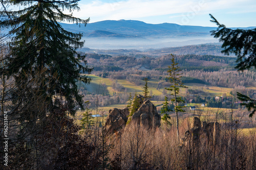 Rudawy Janowickie Poland landscape with rock formations forest valley scenic mountain view