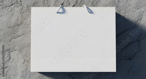 white blank signboard with shadow on gray textured concrete background for advertising