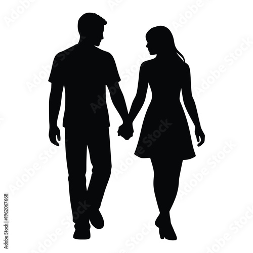 Silhouette of couple holding hands and walking