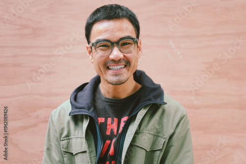 adult asian man.portrait young male.person posing smiling laughing and fun excited surprised thinking positive happy people.empty space for text advertising.background.attractive fashion