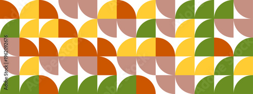 A seamless abstract background featuring a tessellation of geometric shapes in warm autumn colors and green