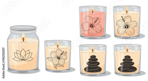 Selection of decorative scented candles in glass jars featuring floral designs and stacked stones for a relaxing spa atmosphere.