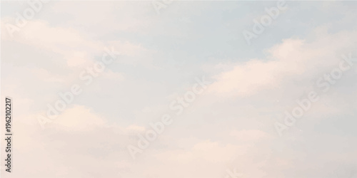 Soft clouds drift lazily across a serene sky, painted in gentle hues, evoking a sense of calm and tranquility. 