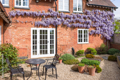 House and garden with patio furniture, UK