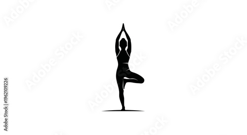 Silhouette of woman performing tree pose yoga, balance and fitness