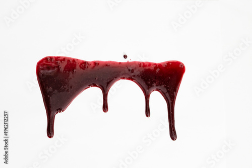 A blood spatter. A blood flowing down. Bloody pattern. Concepts of blood can be used in design. 