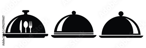 Three black cloche domes with lids on a white background