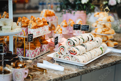 Canvastavla Assorted finger foods and sandwiches on a buffet table