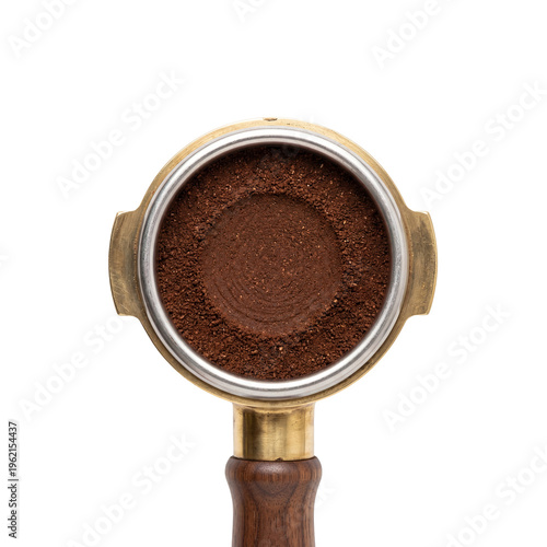 Top view of professional espresso portafilter filled with ground coffee powder
