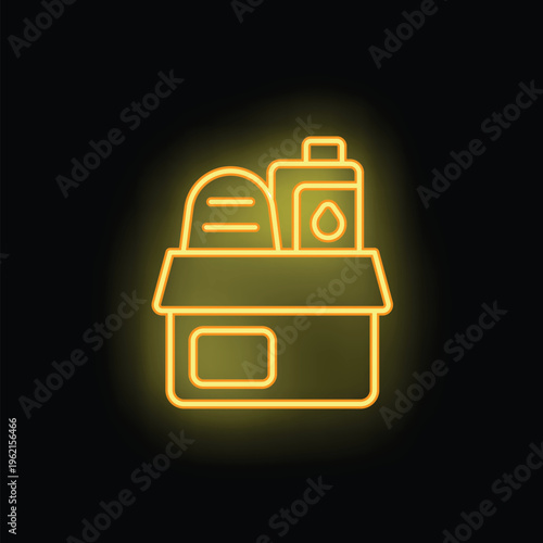 Neon yellow donation box filled with food and personal hygiene products on a black background