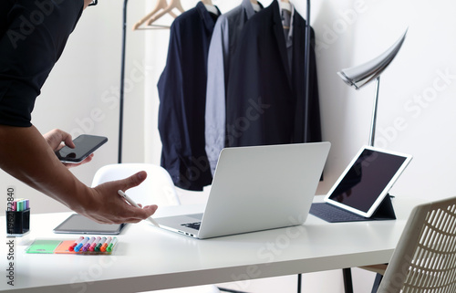 Creative Professional Workspace with Laptop Tablet and Smartphone in Modern Studio