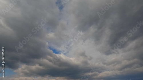 Timelapse of cumulus clouds moves in the blue sky.