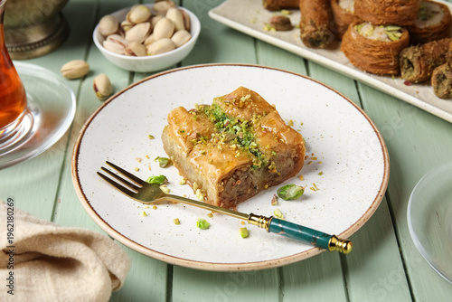 Plates with tasty baklava a...