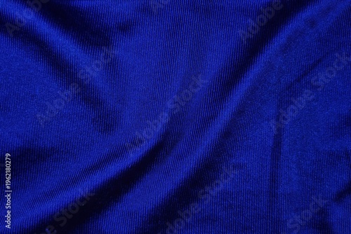Foto Vibrant royal blue jersey fabric with soft draped folds and texture