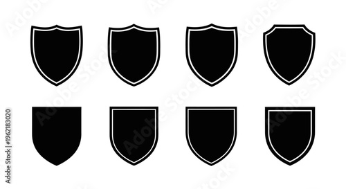 Collection of shields with varied outlines and border designs, representing protection and security in a graphic icon set