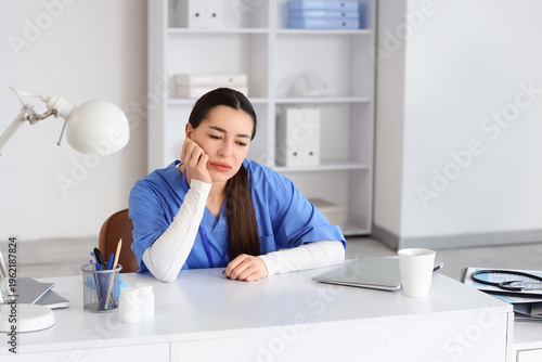 Female doctor suffering fro...