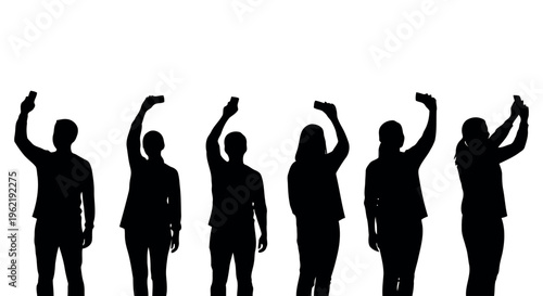 Silhouettes of people holding up their phones