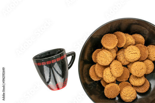 Oatmeal cookies with kitchen utensils isolated on white background, close-up.