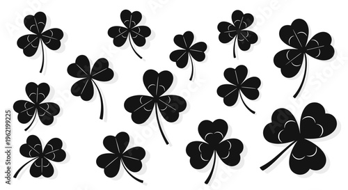 Collection of black shamrocks on a white background representing luck and st patricks day celebration