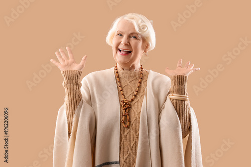 Happy senior woman with sha...