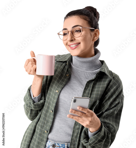 Happy young woman with cup ...