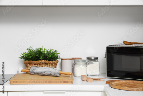 Cutting board with rolling ...