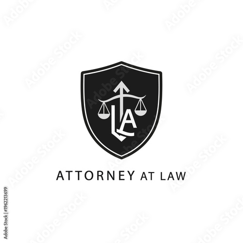 Strong black "Attorney At Law" shield logo with classic scales of justice and initial "A", presented on an isolated white background.