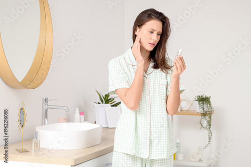 Young woman with acne probl...