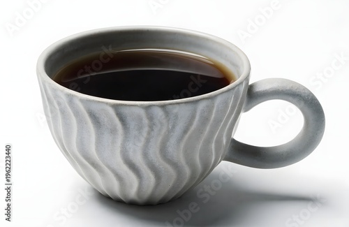 A gray ceramic coffee cup filled with black coffee on a white background