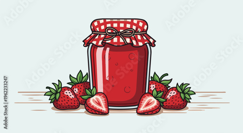 A jar of bright red strawberry jam rests on a wooden surface surrounded by fresh strawberries