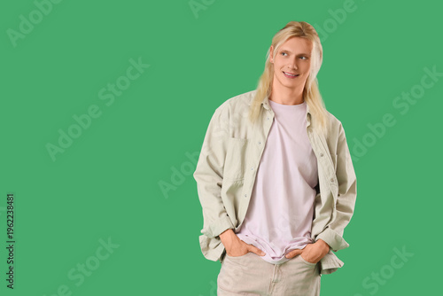 Young blonde man in shirt o...