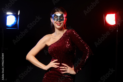 Happy young woman in red pa...