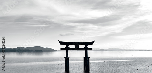 Shirahige Shrine Torii Gate Silhouette Rising from Lake Biwa in Misty Monochrome